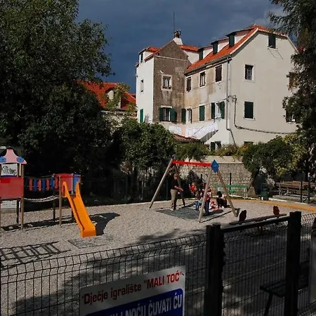 Happy Jackdaw In Center Of Split